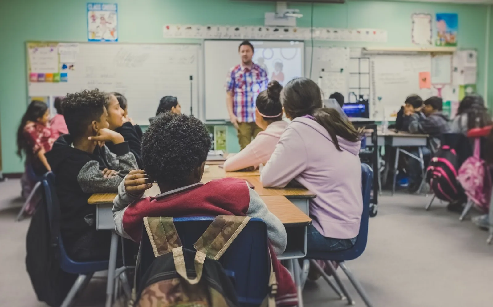 Teacher leading a classroom discussion